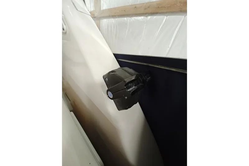 Got Fish Yacht Photos Pics 2005 Tiara Yachts 3200 Open, close-up of a mounted component in storage.