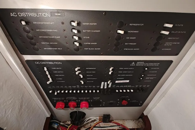 Got Fish Yacht Photos Pics Electrical panel of a 2005 Tiara Yachts 3200 Open, showing AC and DC distribution controls.