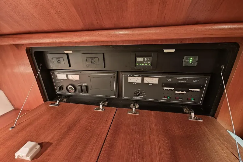 Got Fish Yacht Photos Pics Electrical control panel on a 2005 Tiara Yachts 3200 Open, featuring AC and DC systems.