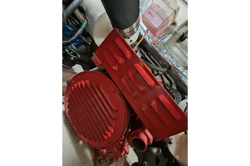 Got Fish Yacht Photos Pics Engine compartment of a 2005 Tiara Yachts 3200 Open, featuring a red engine component.