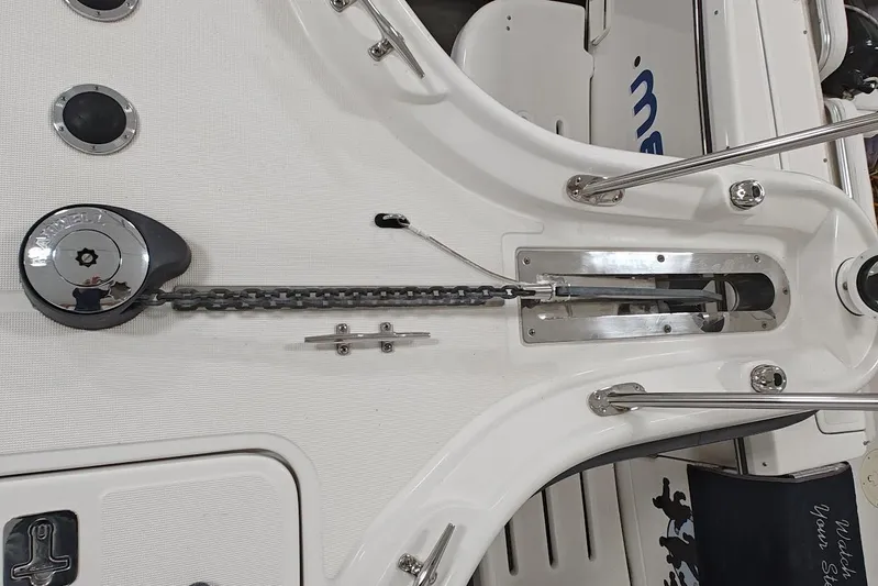 Got Fish Yacht Photos Pics Anchor chain mechanism on a 2005 Tiara Yachts 3200 Open boat deck.