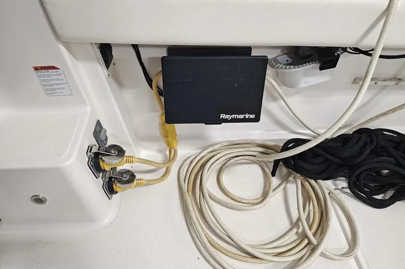 Got Fish Yacht Photos Pics 2005 Tiara Yachts 3200 Open with Raymarine equipment and coiled ropes on deck.