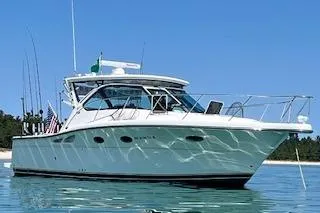 Got Fish Yacht Photos Pics 2005 Tiara Yachts 3200 Open boat on clear blue water, sunny day.