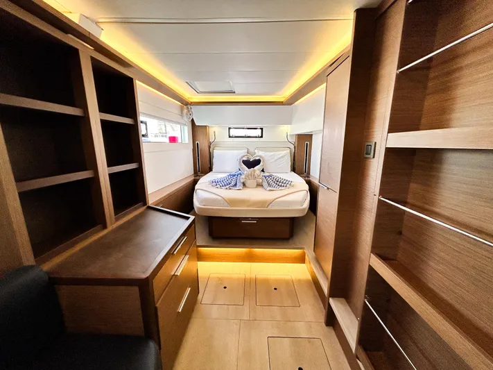 Clearlake III Yacht Photos Pics Luxurious cabin interior of 2021 Lagoon 46 yacht with modern wood finish and ambient lighting.