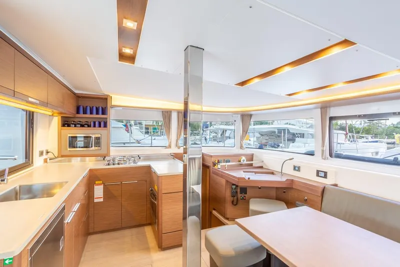 Clearlake III Yacht Photos Pics Modern interior of 2021 Lagoon 46 catamaran with spacious kitchen and dining area.