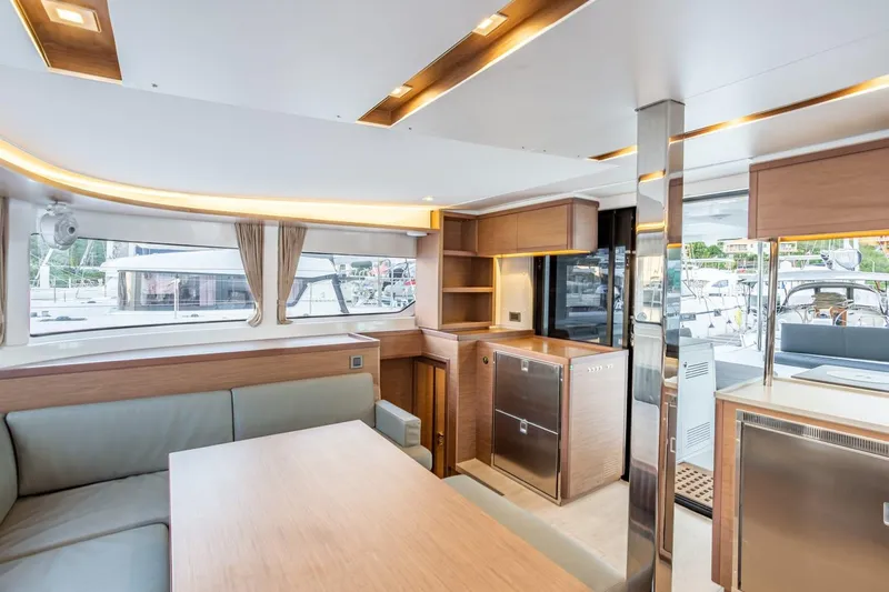 Clearlake III Yacht Photos Pics Modern interior of 2021 Lagoon 46 catamaran with sleek design and ample natural light.