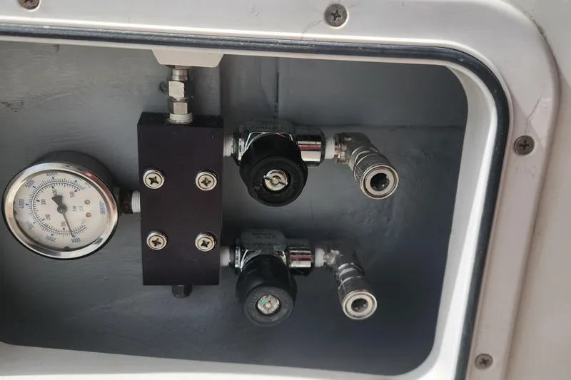 Clearlake III Yacht Photos Pics Pressure gauge and valves inside a 2021 Lagoon 46 yacht compartment.