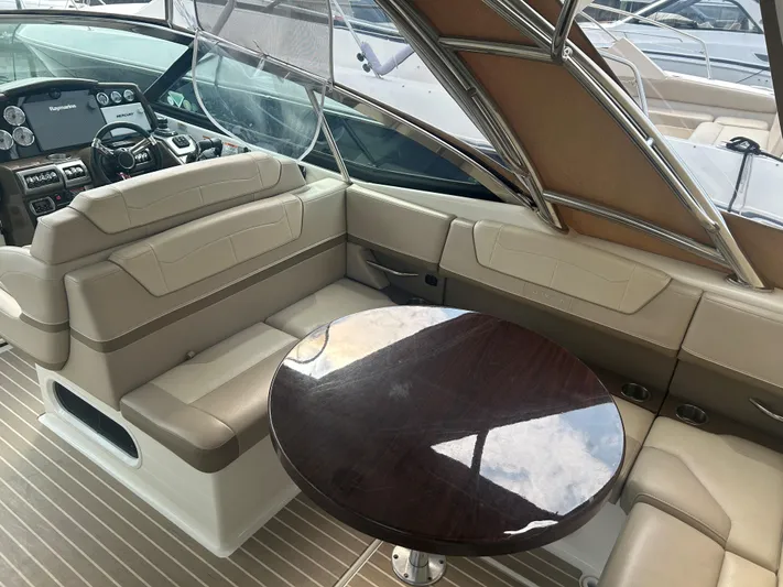  Yacht Photos Pics Luxurious interior of 2017 Formula 350 CBR boat with seating and table.