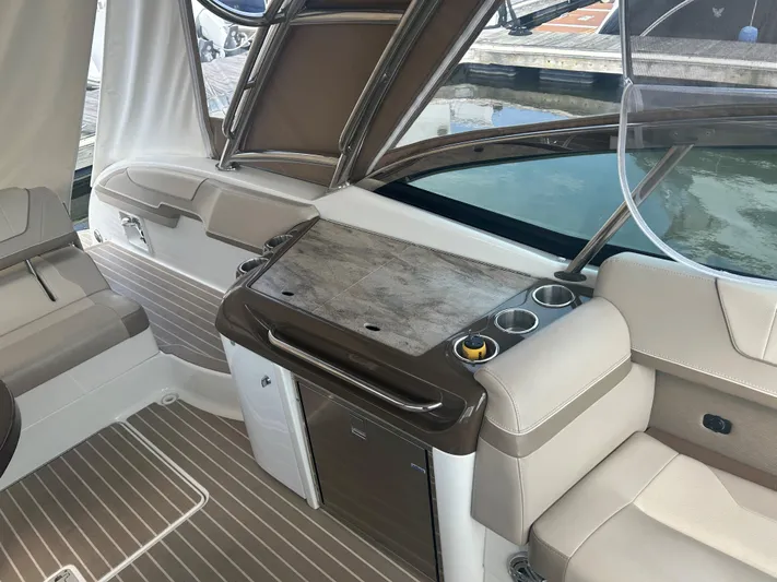  Yacht Photos Pics 2017 Formula 350 CBR boat interior with seating and control panel.