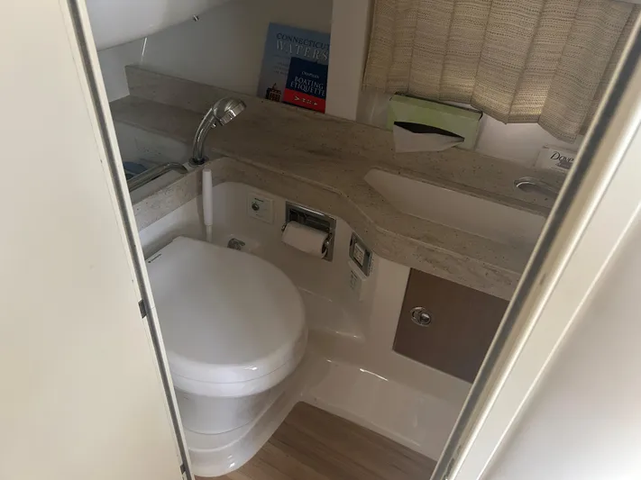 Yacht Photos Pics 2017 Formula 350 CBR boat bathroom with toilet, sink, and countertop.