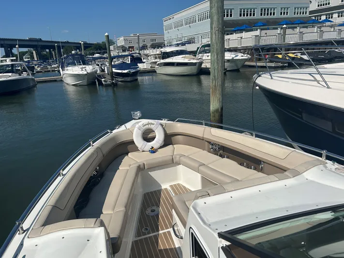  Yacht Photos Pics 2017 Formula 350 CBR boat docked at marina with spacious seating area.