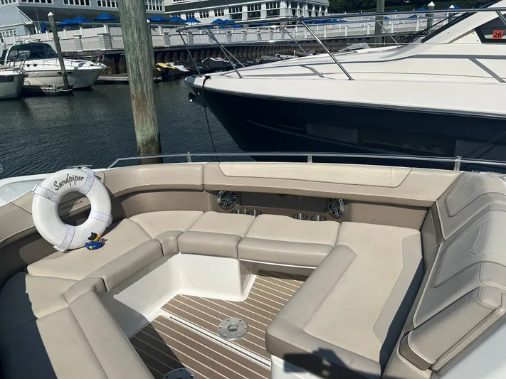  Yacht Photos Pics 2017 Formula 350 CBR boat with spacious seating, docked at a marina.