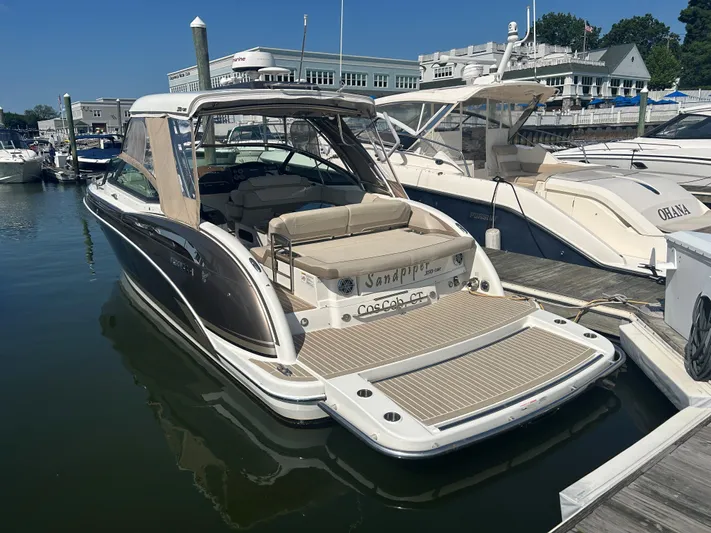  Yacht Photos Pics 2017 Formula 350 CBR boat docked at marina, featuring spacious deck and elegant design.