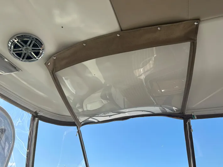  Yacht Photos Pics Interior view of 2017 Formula 350 CBR boat canopy with speaker and clear panel.