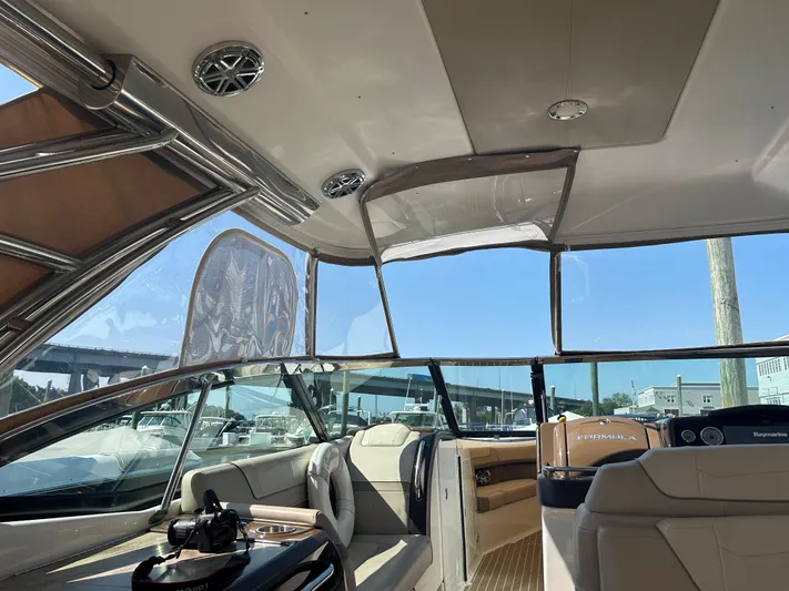  Yacht Photos Pics Interior view of 2017 Formula 350 CBR boat with luxurious seating and clear canopy.