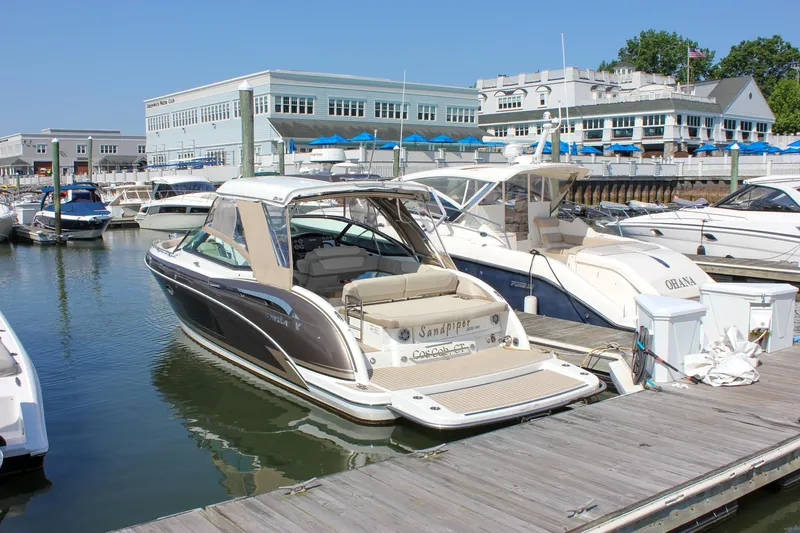  Yacht Photos Pics 2017 Formula 350 CBR boat docked at a marina with other vessels.