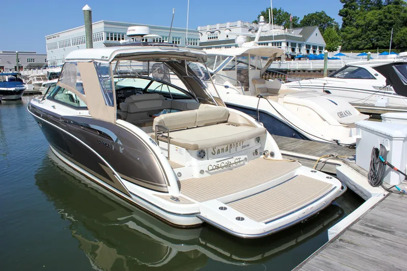  Yacht Photos Pics 2017 Formula 350 CBR boat docked at marina, featuring sleek design and spacious deck.