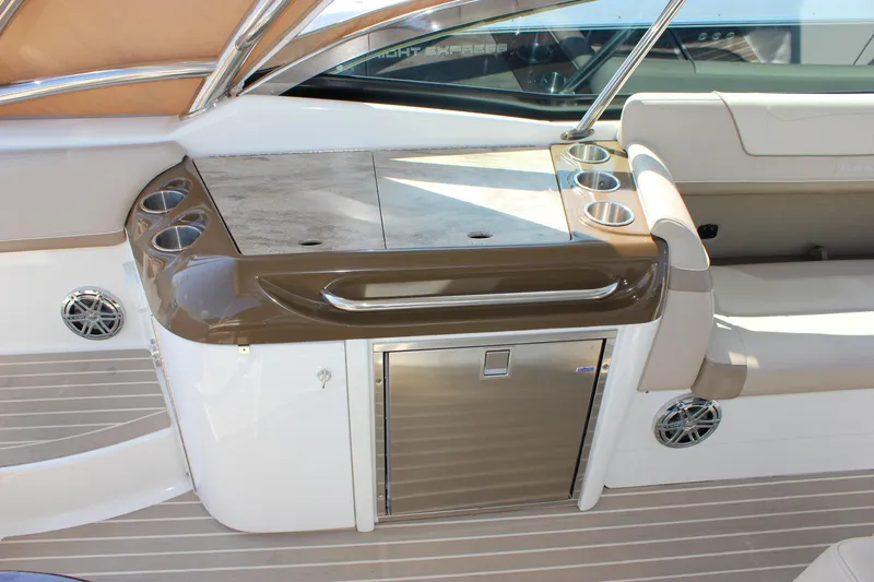  Yacht Photos Pics 2017 Formula 350 CBR boat interior with seating, cup holders, and storage.
