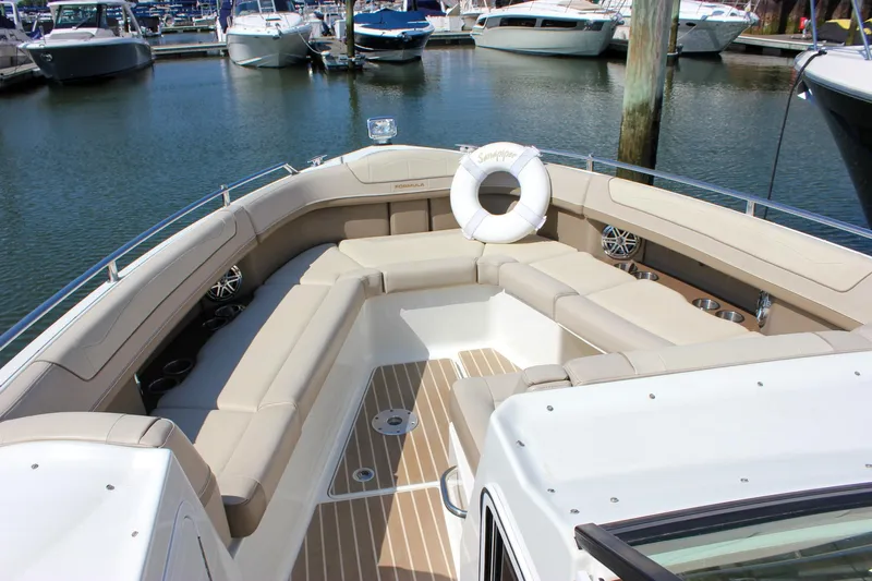  Yacht Photos Pics 2017 Formula 350 CBR boat interior with beige seating, docked in marina.