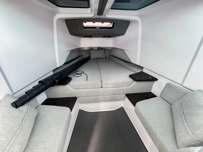 Yacht Photos Pics 2024 Axopar 37XC CROSS CABIN interior with modern seating and spacious layout.