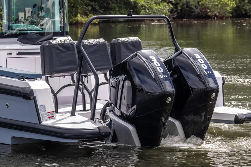  Yacht Photos Pics 2024 Axopar 37XC CROSS CABIN with dual Mercury 300 V8 engines on water.