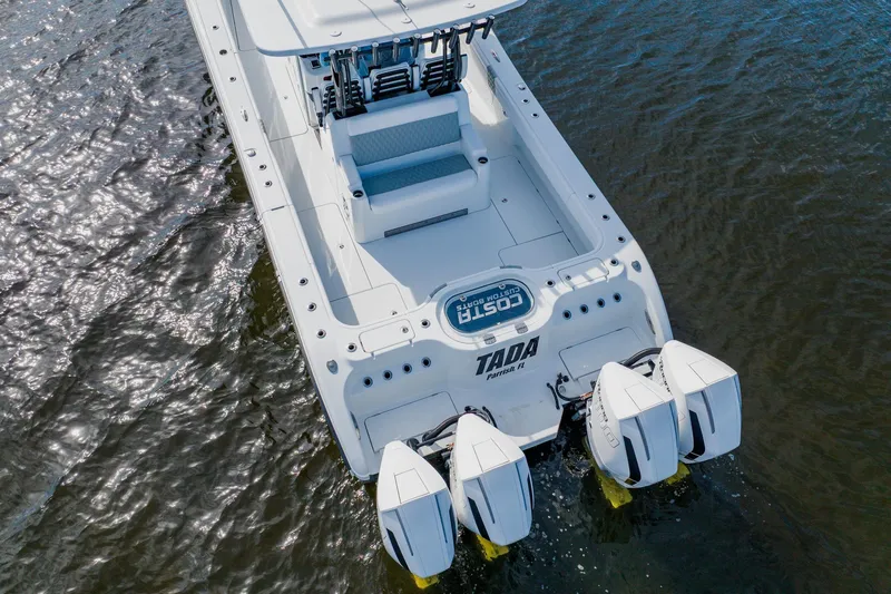  Yacht Photos Pics 2024 Costa Custom Boats 34SV with triple engines on water.