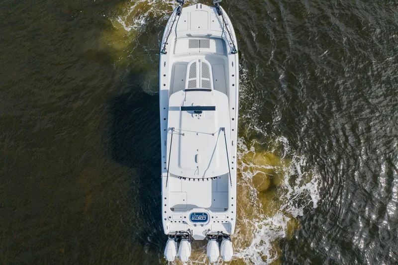  Yacht Photos Pics Overhead view of 2024 Costa Custom Boats 34SV navigating through water.
