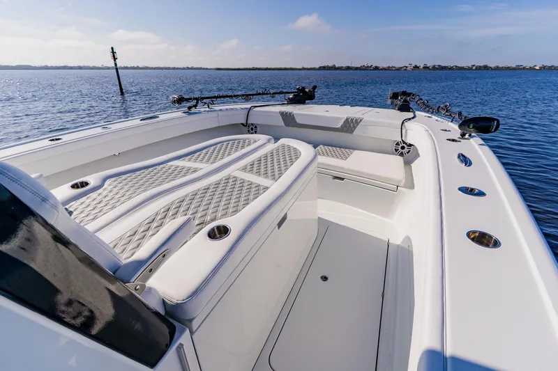  Yacht Photos Pics 2024 Costa Custom Boats 34SV, luxurious deck view on calm waters.