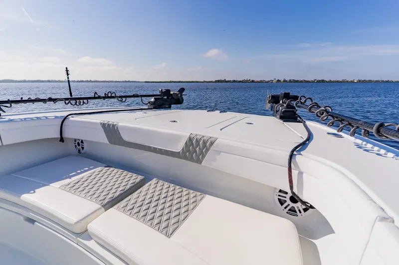  Yacht Photos Pics 2024 Costa Custom Boats 34SV, luxurious seating, ocean view, clear blue sky.