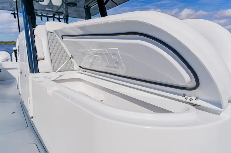  Yacht Photos Pics 2024 Costa Custom Boats 34SV, open storage compartment, sleek design, luxury marine craftsmanship.