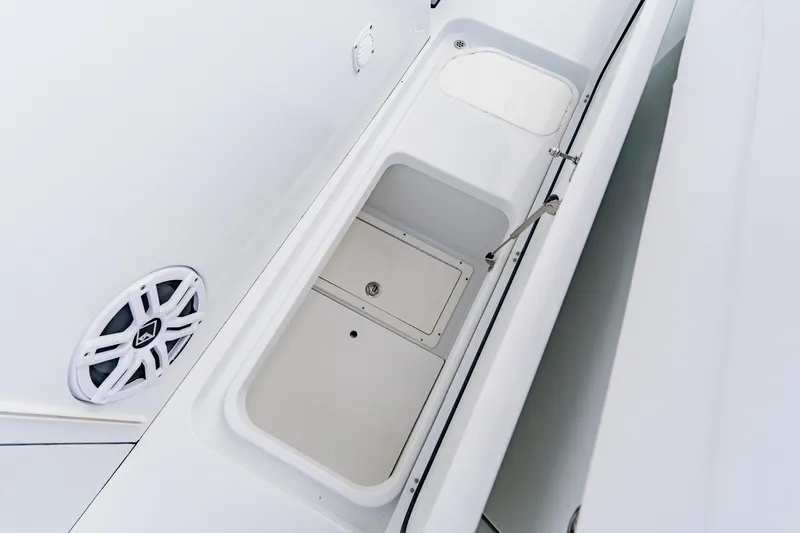  Yacht Photos Pics 2024 Costa Custom Boats 34SV storage compartment with speaker detail.