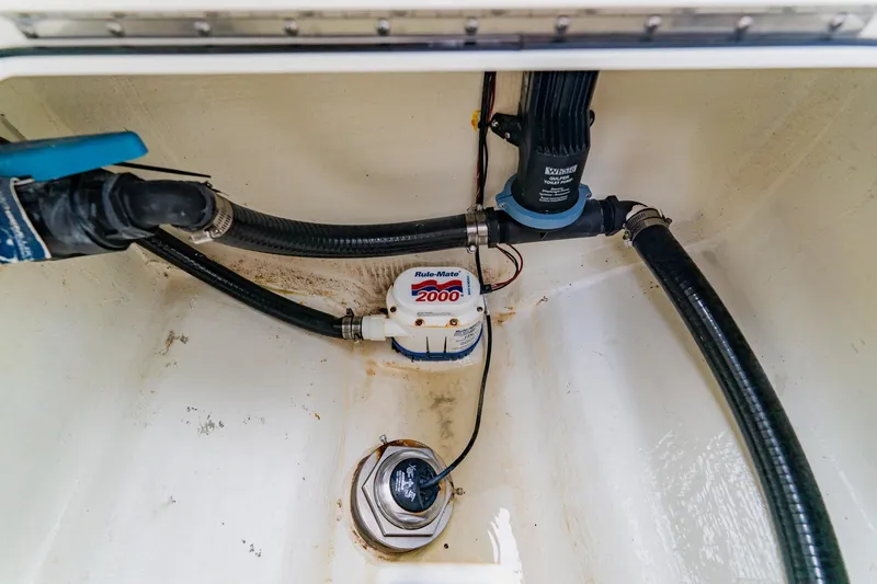  Yacht Photos Pics 2024 Costa Custom Boats 34SV bilge area with pump and hoses.