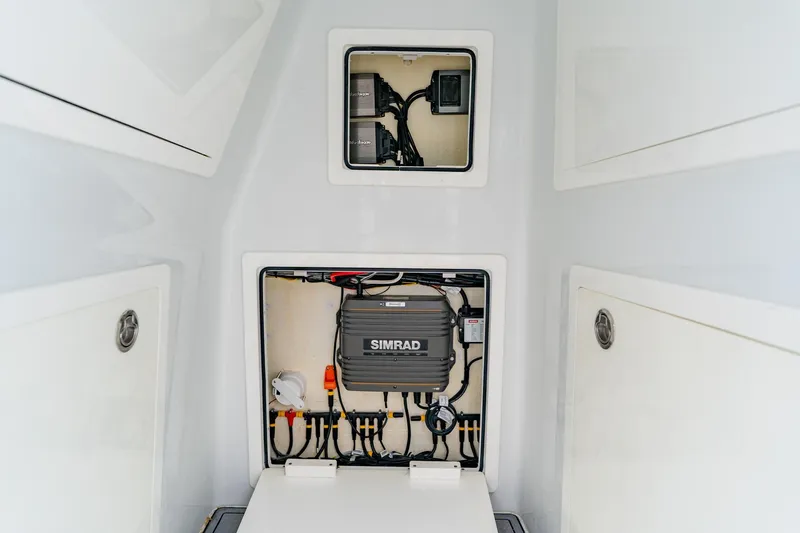  Yacht Photos Pics 2024 Costa Custom Boats 34SV electrical panel with Simrad system, showcasing advanced marine technology.