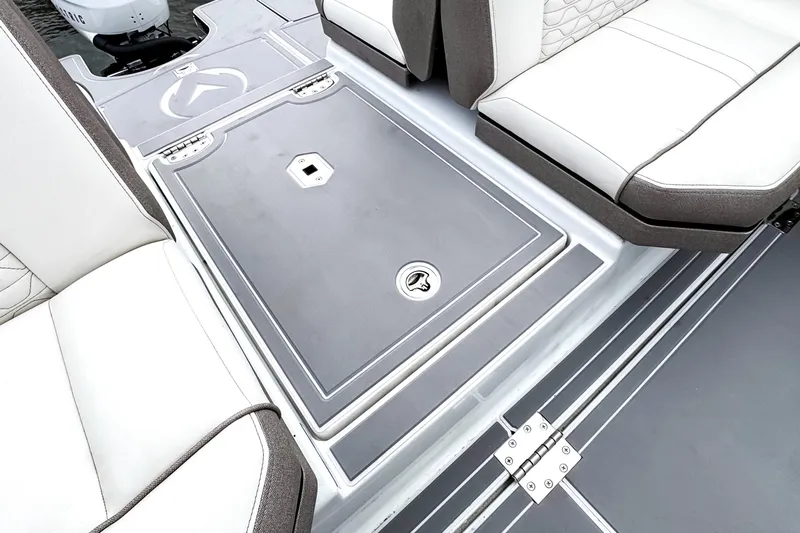  Yacht Photos Pics 2026 Ingenity EL boat interior with sleek seating and storage compartment.