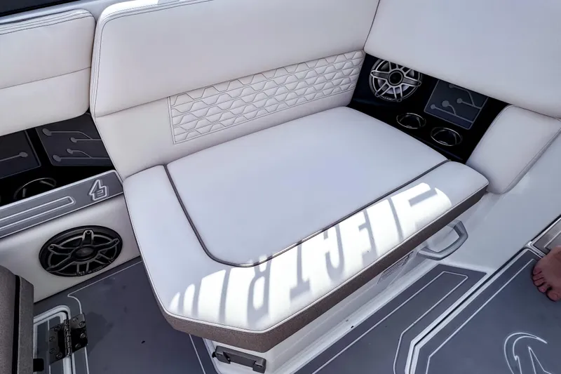  Yacht Photos Pics Luxurious seating on 2026 Ingenity EL boat with modern design and integrated speakers.