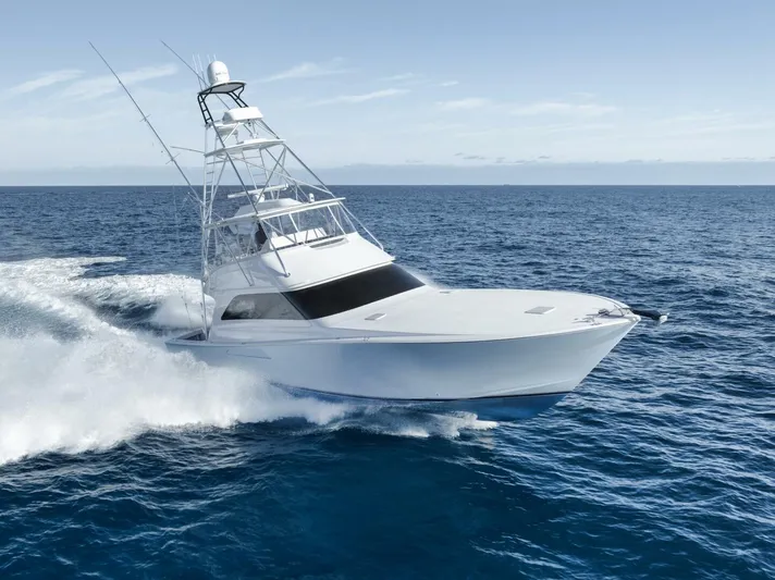 Big Fish II Yacht Photos Pics 2005 Viking Convertible yacht cruising on open ocean waters.