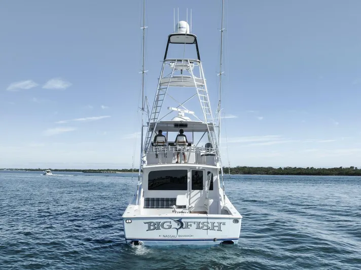 Big Fish II Yacht Photos Pics 2005 Viking Convertible yacht "Big Fish" on calm waters, rear view.