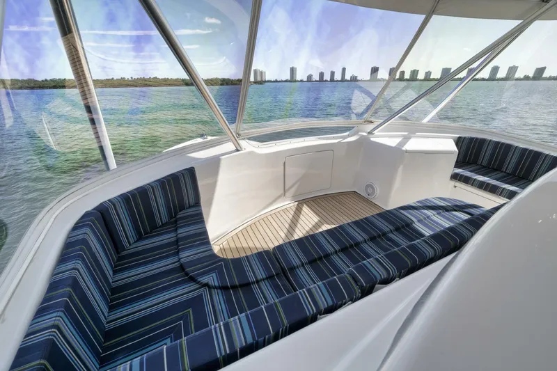 Big Fish II Yacht Photos Pics Luxurious seating area on a 2005 Viking Convertible yacht with scenic water views.