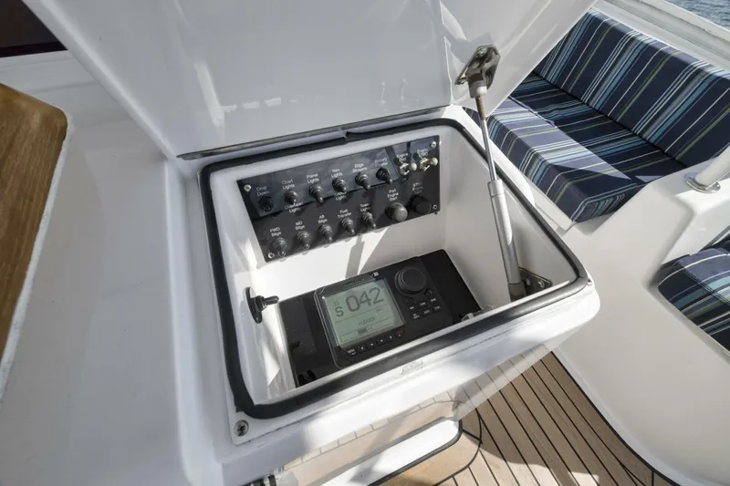 Big Fish II Yacht Photos Pics Control panel on 2005 Viking Convertible yacht, featuring navigation and communication equipment.