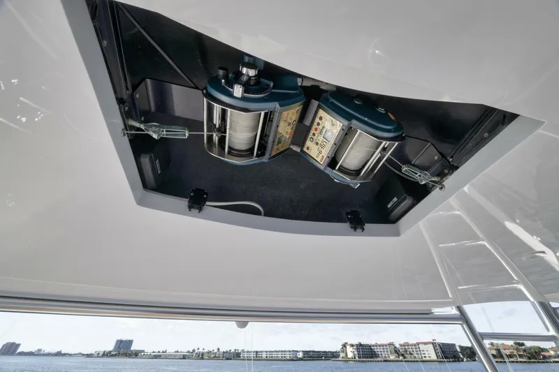 Big Fish II Yacht Photos Pics 2005 Viking Convertible yacht with fishing reels, ocean view in background.