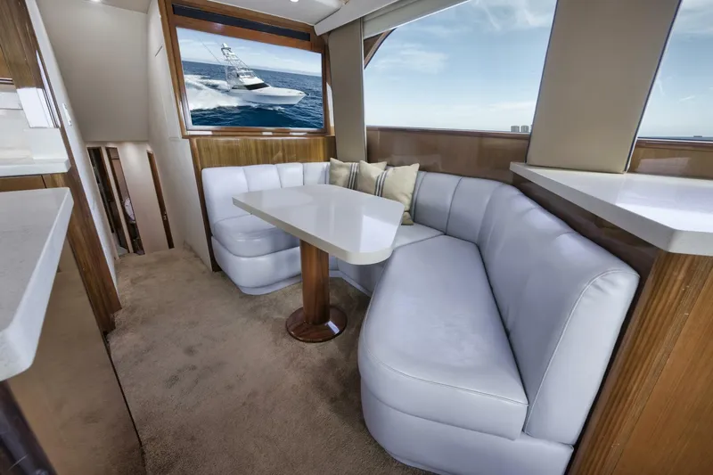 Big Fish II Yacht Photos Pics Luxurious interior of a 2005 Viking Convertible yacht with plush seating and elegant design.