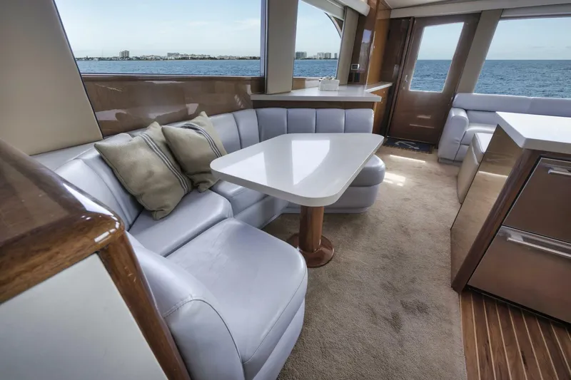 Big Fish II Yacht Photos Pics Luxurious interior of a 2005 Viking Convertible yacht with plush seating and ocean view.