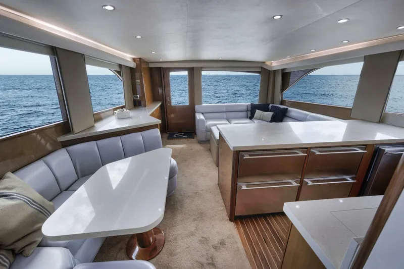 Big Fish II Yacht Photos Pics Luxurious interior of a 2005 Viking Convertible yacht with ocean view.