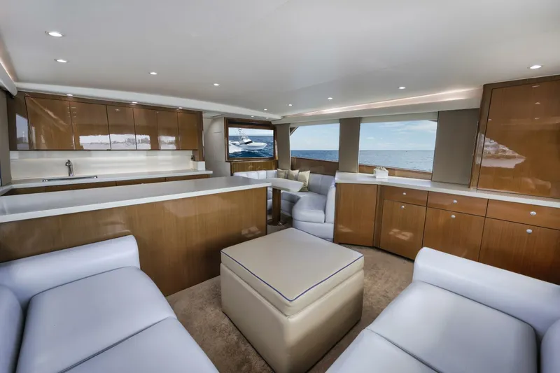 Big Fish II Yacht Photos Pics Luxurious interior of a 2005 Viking Convertible yacht with modern furnishings and ocean view.