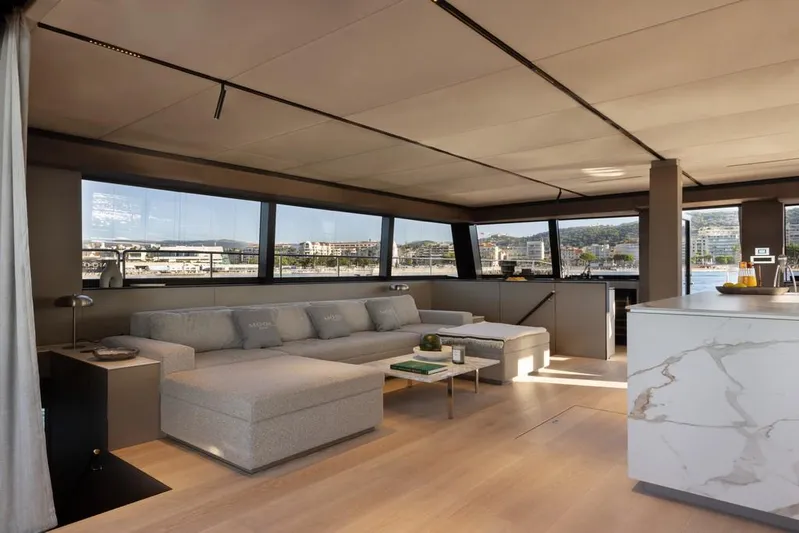 Full Moon Yacht Photos Pics Luxurious interior of 2024 Moon 60 Sail yacht with modern design and panoramic windows.