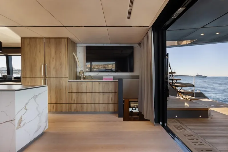 Full Moon Yacht Photos Pics Luxurious interior of 2024 Moon 60 Sail yacht with modern design and ocean view.