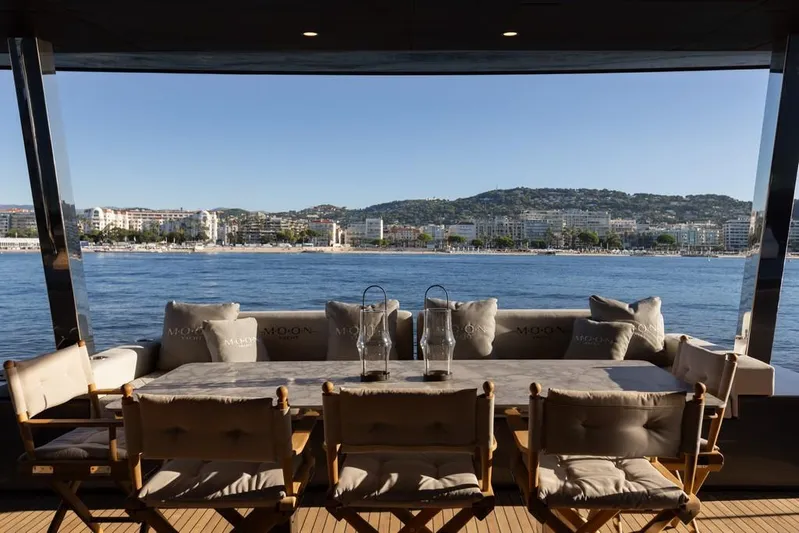 Full Moon Yacht Photos Pics Luxury yacht dining area with ocean view, Moon 60 Sail 2024 model.