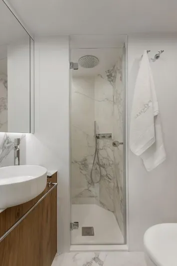 Full Moon Yacht Photos Pics Luxurious bathroom with marble shower in 2024 Moon 60 Sail yacht.
