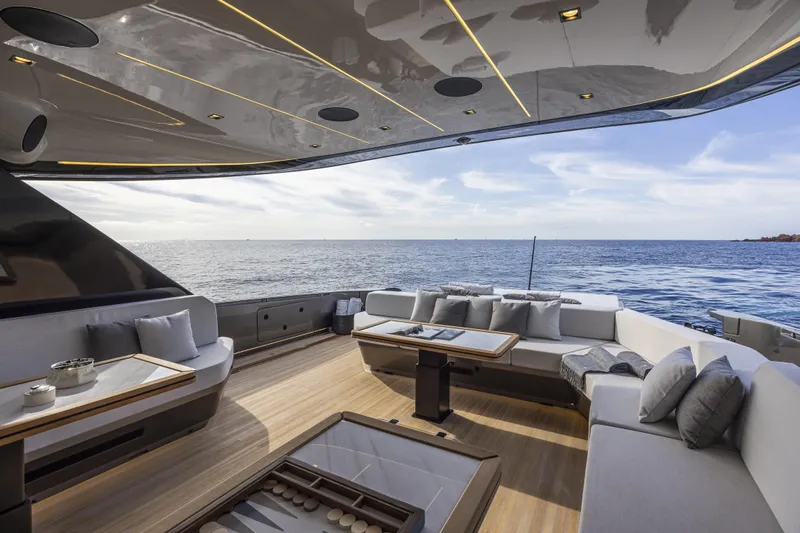  Yacht Photos Pics Luxurious 2024 Otam 90 GTS yacht interior with elegant seating and ocean view.