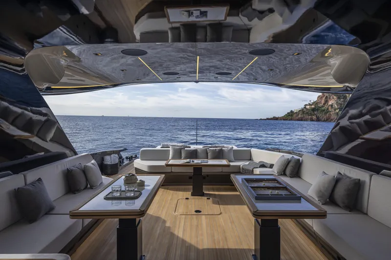  Yacht Photos Pics Luxurious interior of 2024 Otam 90 GTS yacht with ocean view and elegant seating.
